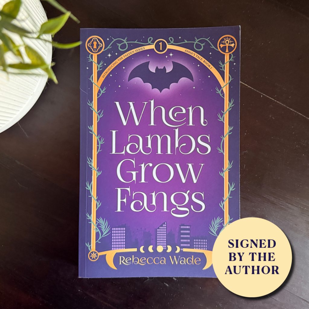 When Lambs Grow Fangs paperback with 'signed by the author' sticker